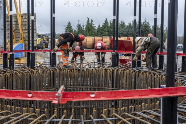Assembly of reinforcing steel for the reinforced concrete foundation of a wind turbine, a mesh of rebar and rebar mesh, over 100 tons of reinforcing steel were used, the wind turbine will have a hub height of 160 meters, part of a new wind farm in Sauerland, near Balve, North Rhine-Westphalia, Germany