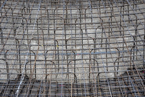 Concreting, concreting the foundation of a wind turbine, more than 600 cubic meters of concrete will be pumped into the foundation for over 7 hours, over 100 tons of reinforcing steel have been used, the wind turbine will have a hub height of 160 meters, part of a new wind farm in Sauerland, near Balve, North Rhine-Westphalia, Germany