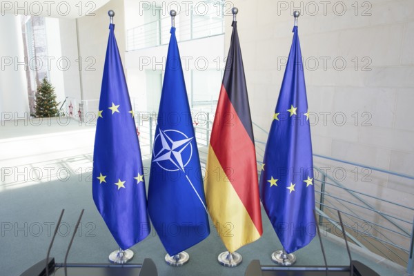 Flags of the Federal Republic of Germany, the EU and NATO after a press conference by Mark Rutte (Secretary General of NATO) and Friedrich Merz (Chancellor of the Federal Republic of Germany, CDU) following a one-on-one meeting at the Federal Chancellery, Berlin, 11 December 2025