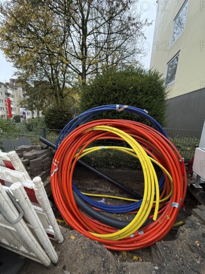 Construction site with rolled up fiber optic cables in Wuppertal, Germany