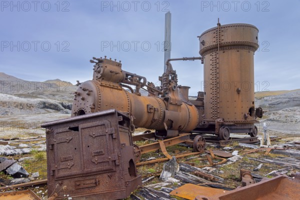 Steam engine at abandoned marble quarry Camp Mansfield, Ny London near Ny-Alesund, Blomstrandhalvøya, Kongsfjorden, Svalbard, Spitsbergen, Norway