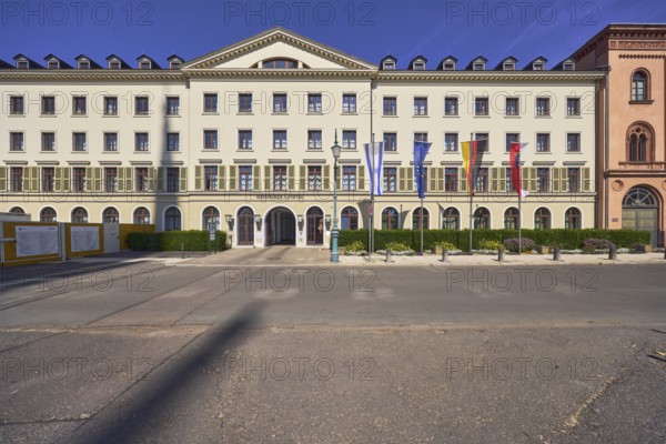 Hessian state parliament, former court marshal office, architectural style classicism, flagpoles, flags, Israeli flag, German flag, European flag, flag of Hesse, entrance area, façade with windows and shutters, dormers, hedge, flower bed, deep blue sky, cirrus clouds, castle square, Wiesbaden, state capital, district-free city, Hesse, Germany
