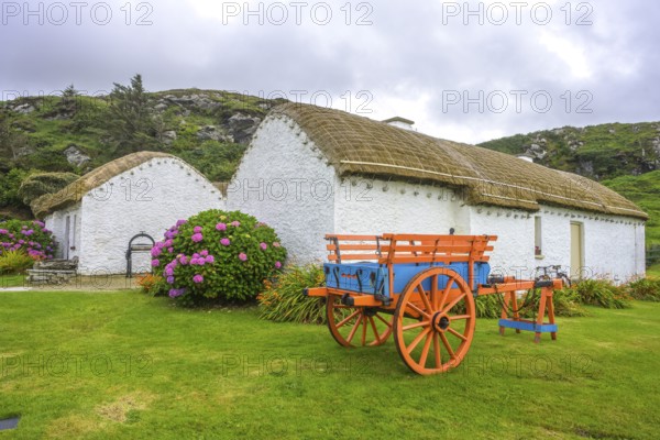 Colourfully painted horse cart, open-air museum, Glencolmcille, County Donegal, Ireland