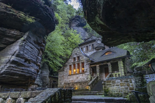 Pension and restaurant The old gas plant at dusk, Hrensko, Czech Republic