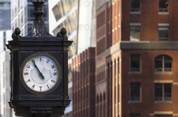 Toronto Union Station clock in front of Union Station, main city passenger transportation hub that services intercity and international connections