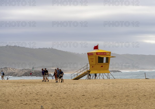 Yellow lifeguard surveillance container on Nazare beach, Portugal
