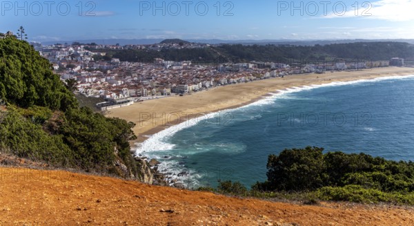 View from Leuct Tower towards orange tiled roofs in the town of Nazare, Estremadura, Portugal