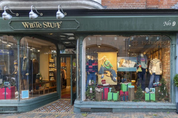 Older woman poster used in window display for White Stuff clothing shop, Ipswich, Suffolk, England, UK