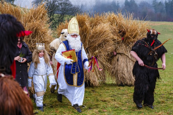 Nikolaus and Engerl with Buttnmandl and Krampus, Bischofswiesen, Berchtesgadener Land, Upper Bavaria, Bavaria, Germany