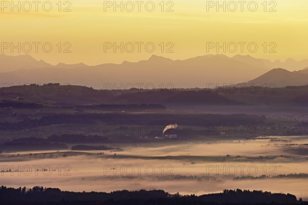 View from Horben of the Reuss Valley covered in fog, behind it the Glarus Alps in the light of the rising sun, Beinwil-Freiamt, Canton, Aargau, Switzerland