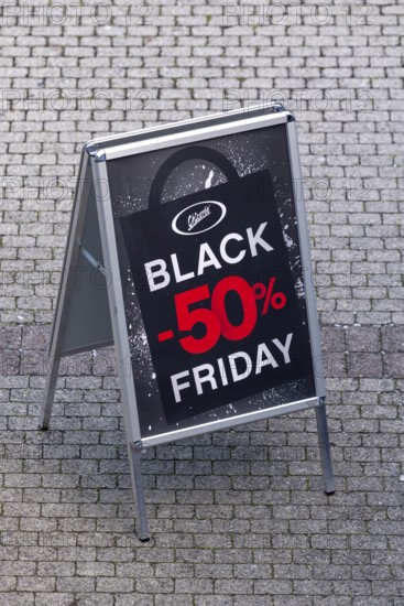 Symbolic photo advertising sign Chicoree Black Friday 50% discount, Lucerne, Switzerland