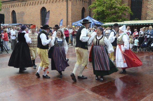 Folk dance performance with dancers in typical costumes from Skåne, in Ystad, Skåne County, Sweden, Scandinavia