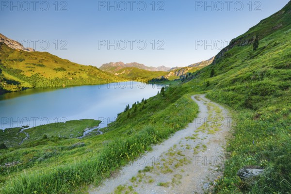Hiking trail along Lake Engstlensee, Engstlenalp, Canton of Bern, Switzerland