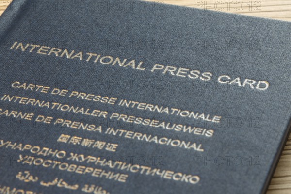 Close-up of an international press pass