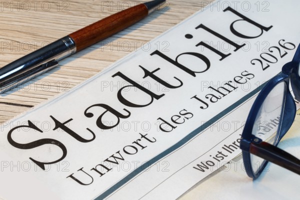 Possible bad word of the year? Symbolic newspaper with the headline CITYSCAPE — UNWORD OF THE YEAR 2026