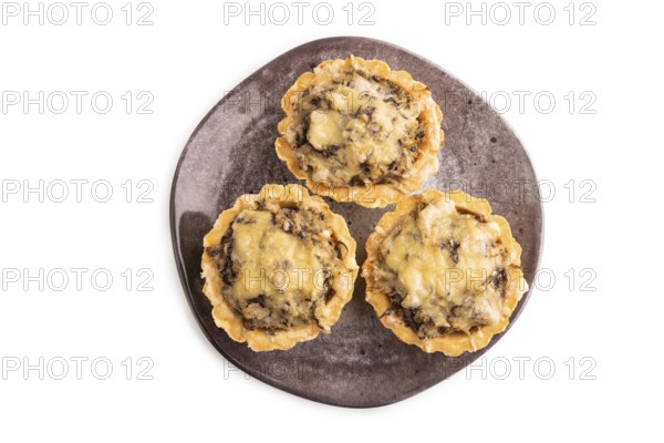 Tartlets with meat and cheese isolated on white background. top view, flat lay, copy space