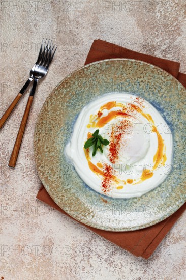 ?ilbir, traditional Turkish breakfast, Turkish eggs with yogurt and butter, homemade, no people