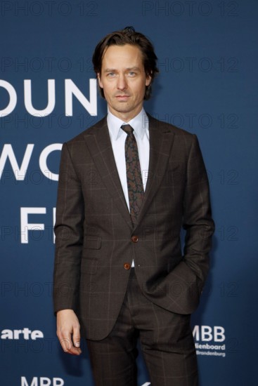 Tom Schilling at the festival opening and the premiere of the movie 'Sentimental Value' at the 20th World Cinema Festival Around the World in 14 films at the cinema at KulturBrauerei in Berlin on 28.11.2025