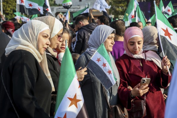 Damascus, Syria. November 28, 2025: Thousands of Syrians gather in Umayyad Square in central Damascus to celebrate the anniversary of the military operation that led to the fall of Bashar al-Assad's regime. Demonstrators express joy and unity while denouncing Israeli attacks on Syrian territory, Damascus, Damascus, Syria