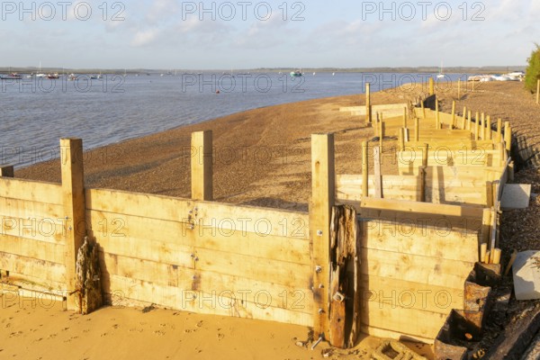Temporary coastal defences erected by Bawdsey Haven Yacht Club, response to rapid erosion beach depletion, River Deben, Bawdsey, Suffolk, England, UK Nov 2025