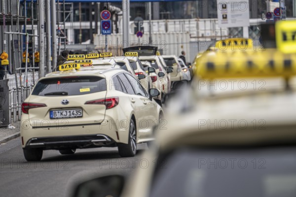 Taxis in front of the main train station in Berlin, waiting in line for passengers, Germany