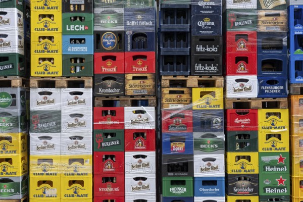 Empty beverage crates, from various manufacturers, bottling, types, stacked at a restaurant, for transport, deposit system, Germany