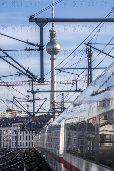 Railway line in Berlin, east of Friedrichstraße station, looking east, Berlin TV tower, ICE train on the line