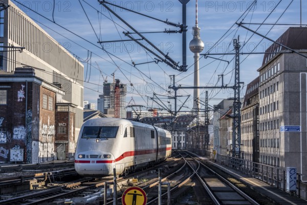Railway line in Berlin, east of Friedrichstraße station, looking east, Berlin TV tower, ICE train on the line