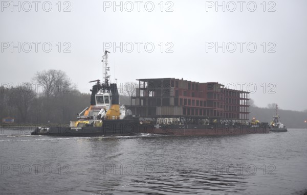 Tugboats transport parts of a ship in fog through the Kiel Canal, NOK, Kiel Canal, Kiel Canal, Schleswig-Holstein, Germany
