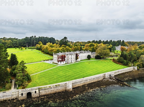 Autumn over Plas Newydd House from a drone, Gardens and Parkland, Llanfairpwllgwyngyll, Anglesey, Wales, UK