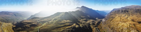 Autumn colours of Pen-y-Pass over Miner's Track, Start Point and road A4086 from a drone, Snowdonia, Wales, UK