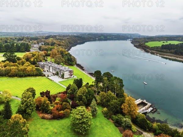 Autumn over Plas Newydd House from a drone, Gardens and Parkland, Llanfairpwllgwyngyll, Anglesey, Wales, UK