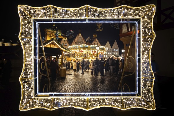 With the lighting on the Mrs. Holle Christmas tree, a 30-meter high Nordmann fir tree, the Frankfurt Christmas Market was officially opened on 24.11.2025. The Christmas market will be open until December 22 from Monday to Saturday from 10:00 to 21:00 and on Sundays from 11:00 to 21:00, Römerberg, Frankfurt am Main, Hesse, Germany