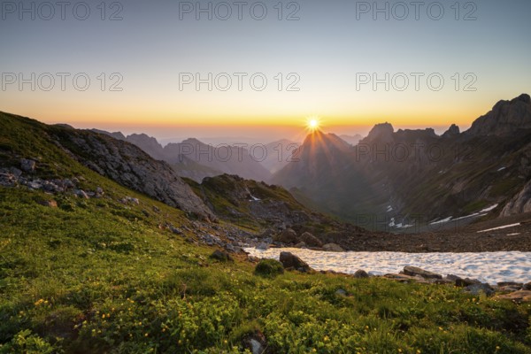 View over Alpstein Mountains into the Meglisalp Valley at sunrise, Rotstein Pass, Säntis, Appenzell, Switzerland