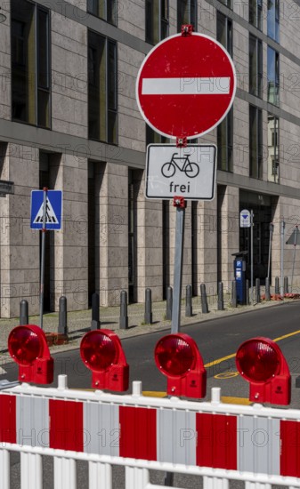 Barriers and signs with traffic signs at road construction sites in Berlin Mitte, Berlin, Germany