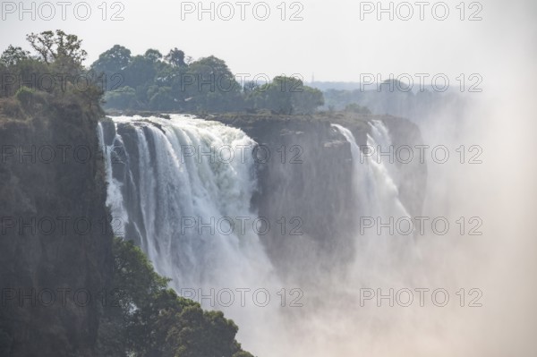 Water plunges into the depths, Victoria Falls with gorge, Zambezi, Zimbabwe