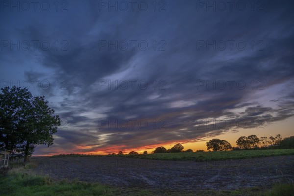 Red evening sky, Othenstorf, Mecklenburg-Western Pomerania, Germany