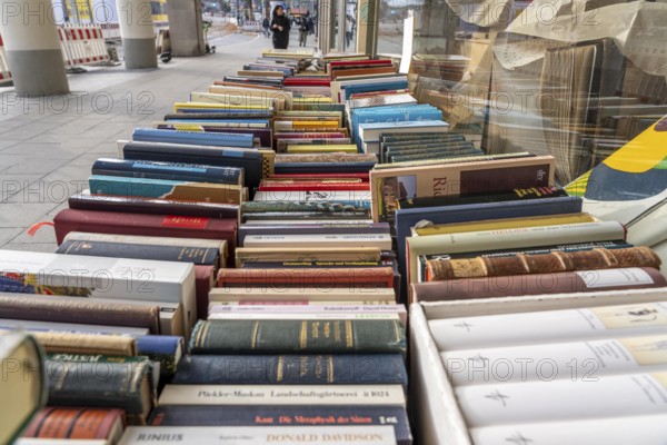 Table with partly old books, offered by a second-hand bookshop