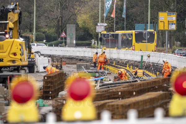 Large-scale construction site in the city center of Essen, Herkulesstraße, the construction of new tracks for the new Stadtbahn-Essen, a new tram line in the city center that will connect the west of the city with the new Essen-51 district, North Rhine-Westphalia, Germany