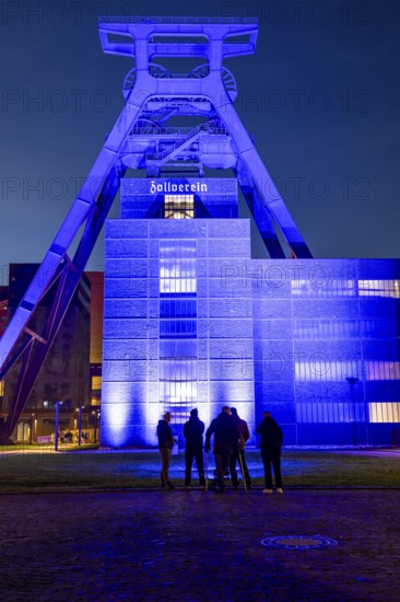 International Children's Rights Day, in addition buildings around the world are illuminated blue, over 60 in Germany, blue illumination for the worldwide action of the United Nations Children's Fund, UNICEF, here the UNESCO World Heritage Zeche Zollverein, the Doppelbock conveyor framework of Schacht XII, Essen, North Rhine-Westphalia