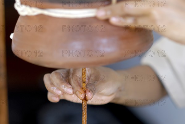 Detail forehead oil glaze or Shirodhara Ayurveda treatment with sesame oil in the spa, Udaipur, Rajasthan, India