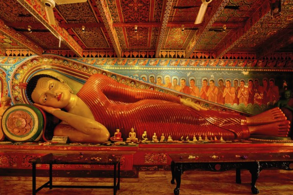 Reclining Buddha statue in Isurumuniya Rajamaha Viharaya temple, Anuradhapura, Sri Lanka
