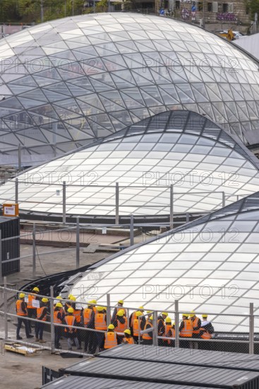 Stuttgart Central Station. Stuttgart 21 construction site. The new transit station is being built here. Light eyes on the roof of the new train station. Bonatz building. Construction site tour with a group of visitors. Stuttgart, Baden-Württemberg, Germany