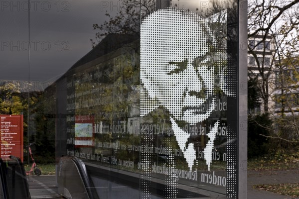 Graphically gridded portrait of Federal President Theodor Heuss on the glass panel at the Heussallee and Museumsmeile subway exit, Bonn, North Rhine-Westphalia, Germany