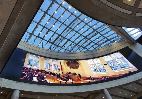 Entrance area in the House of History with the projection of the Bundestag in the old plenary hall in the Wasserwerk, Bonn, North Rhine-Westphalia, Germany