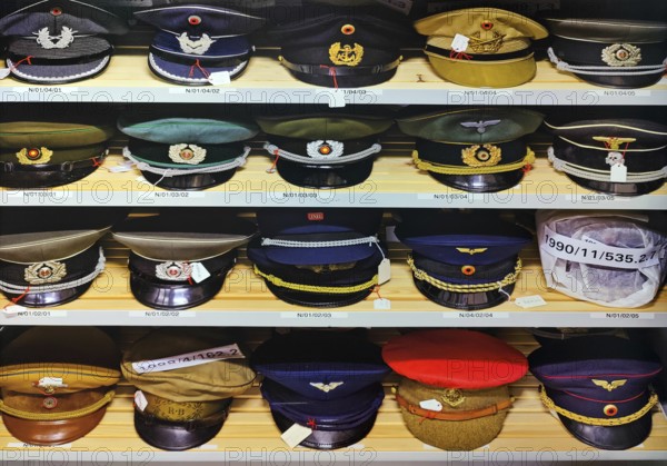 Collection of official caps in the textile depot, House of History, Bonn, North Rhine-Westphalia, Germany