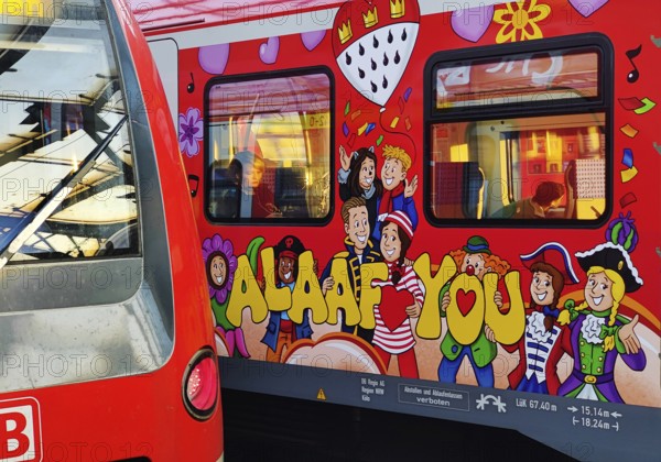 Central Station early in the morning with regional express and S-Bahn with carnival design, Cologne, Rhineland, North Rhine-Westphalia, Germany