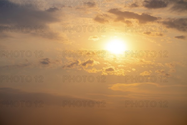 Dramatic sunset with clouds and sun, Etosha National Park, Namibia