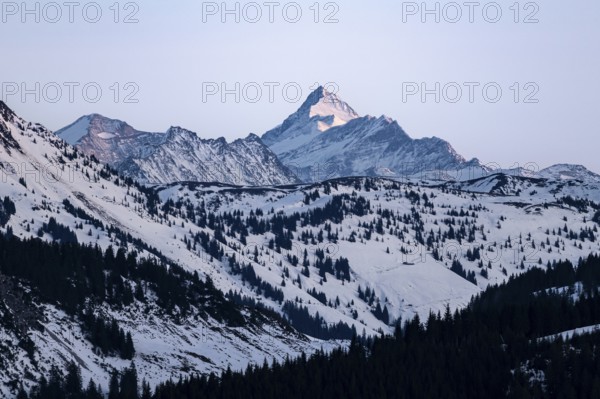 Summit of Grossglockner at sunset in winter, Hochbrixen, Brixen im Thale, Tyrol, Austria