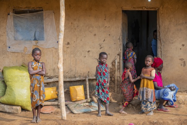 Villagers in a traditional village, mud huts, Sadaani, Tanzania
